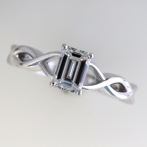1 carat emerald cut diamond infinity engagement ring 1