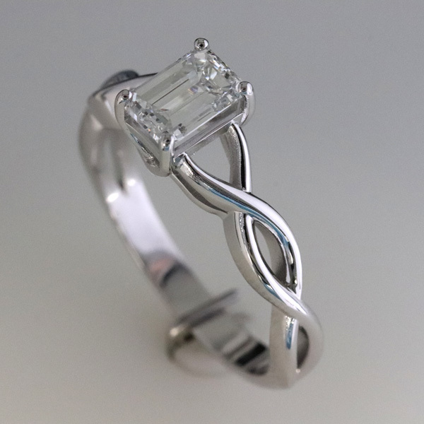 1 carat emerald cut diamond infinity engagement ring 2