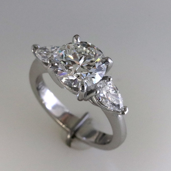 Engagement ring 2 carat round pear shaped diamond sides 2