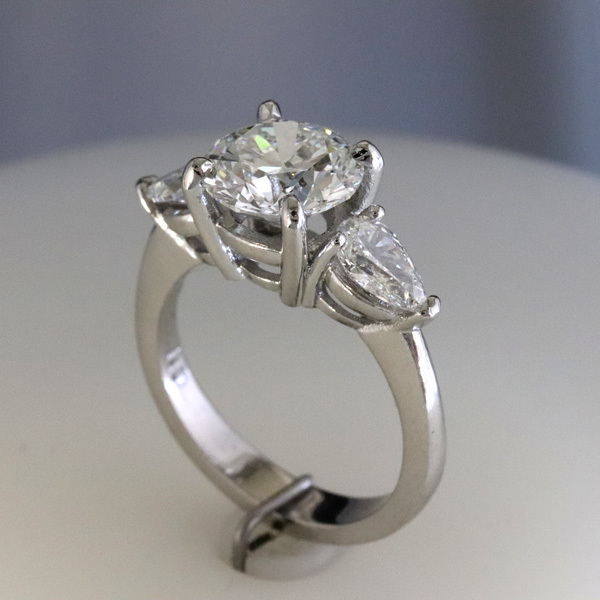 Engagement ring 2 carat round pear shaped diamond sides 3